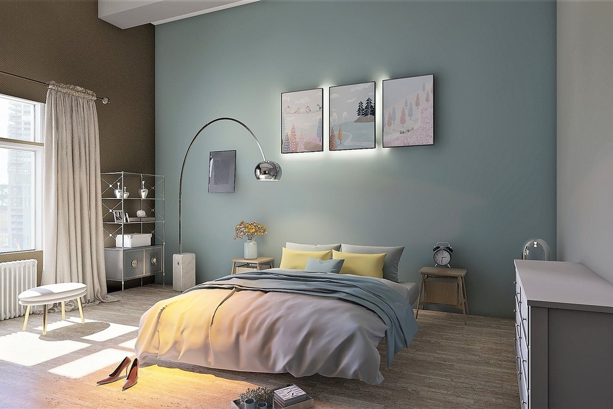 A bedroom with a chest of drawers beside the bed and morning light from the left.