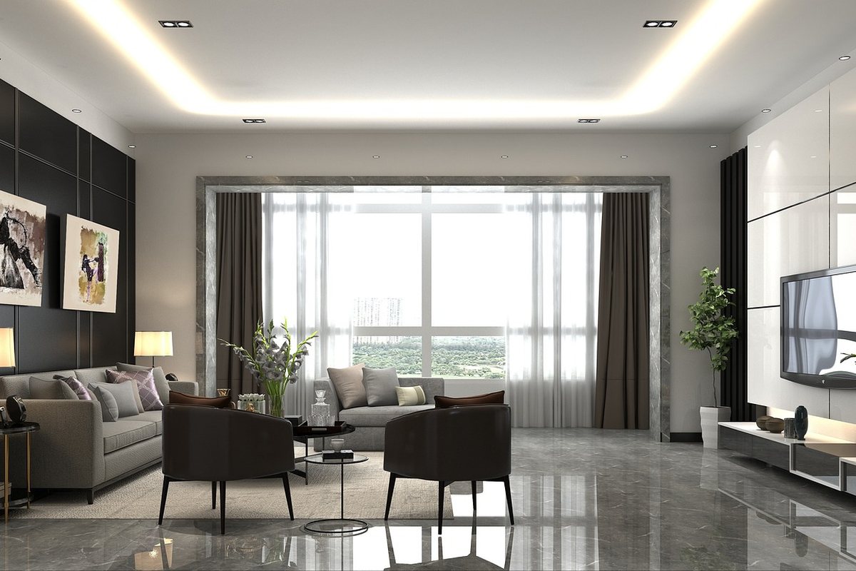 A modern living room with a television, sofa and low console along the wall.
